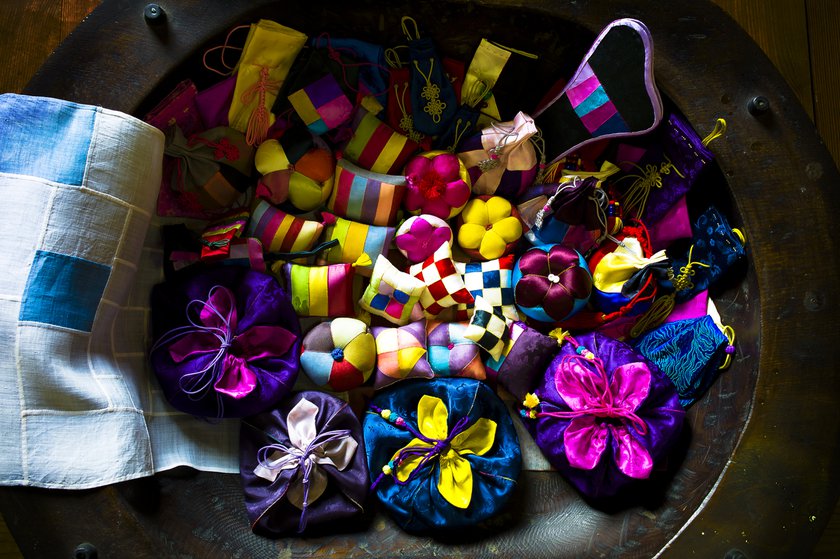 Photo of a bowl filled with a mixture of felt and other fabric knick knacks