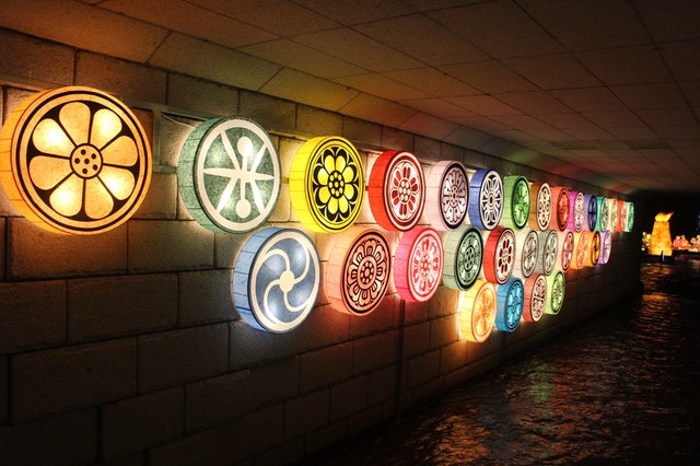 An underground canal filled with circular and patterned lights